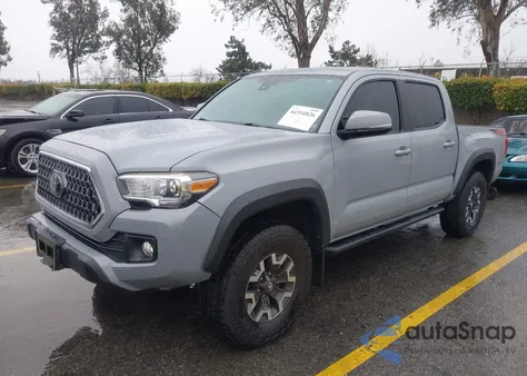 2018 Toyota Tacoma Trd Off Road z USA, uszkodzony, nr VIN 3TMCZ5AN0JM183957